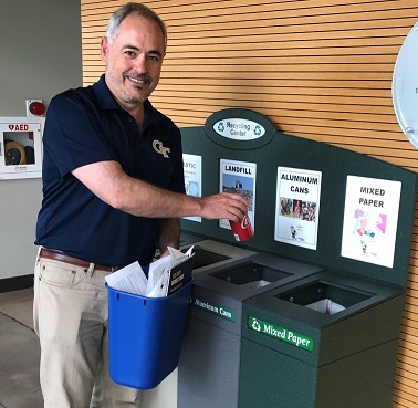 image of President Cabrera recycling